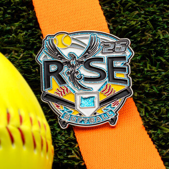 Custom softball medal featuring a phoenix, bats, and the text 'Rise Softball 25' on an orange ribbon.