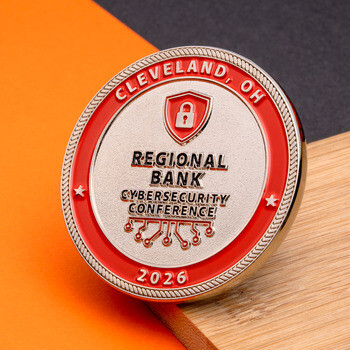 Silver and red challenge coin for the Cleveland, OH Regional Bank Cybersecurity Conference 2026 with a lock shield emblem.